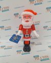 Vintage Christmas PEZ Santa dispenser with slip-on suit and present.